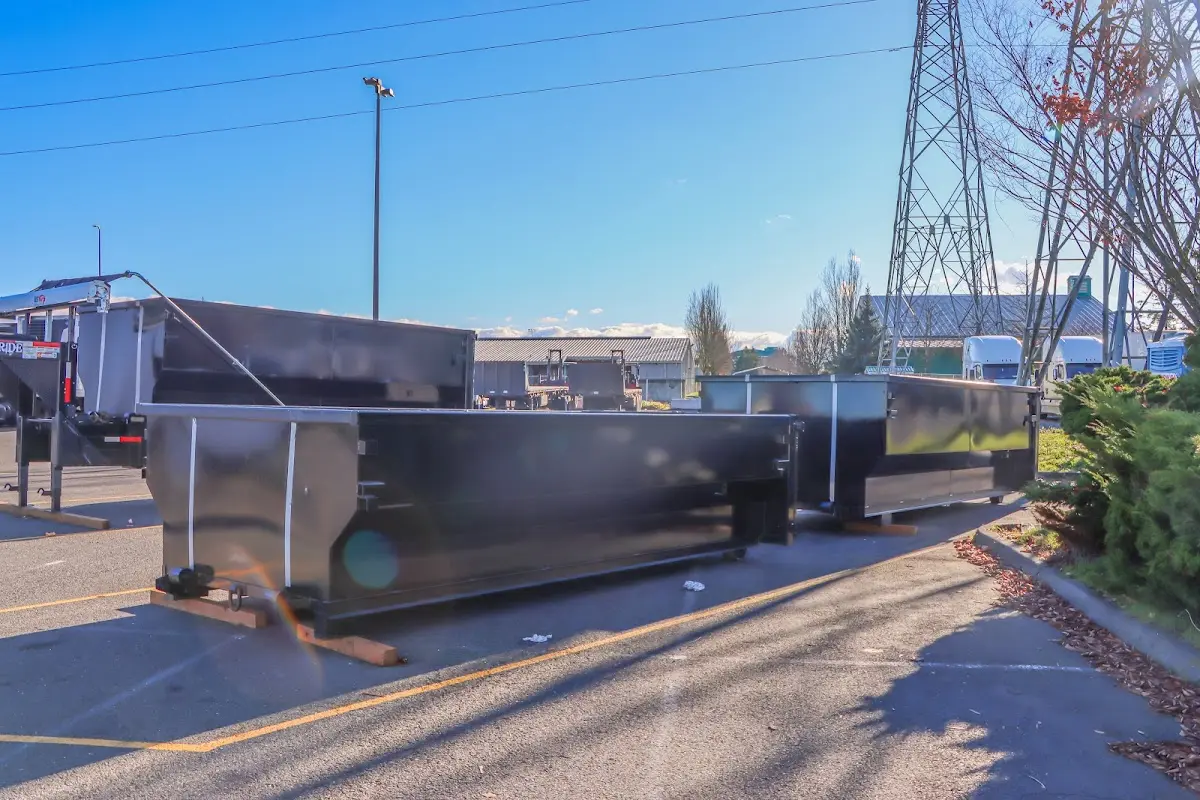 Roll-off dumpster ready for waste disposal at job site for Concrete Dumpster Rental in Dumbarton